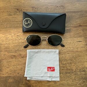 Ray-Ban Oval Sunglasses with Gold Frame and Black Lenses
